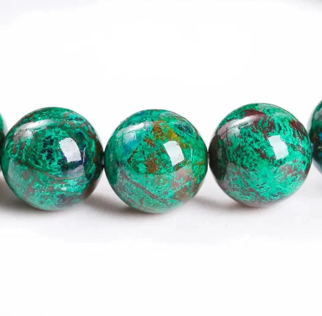 Phoenix jasper and turquoise beaded bracelet shown on a plain surface for daily wear.