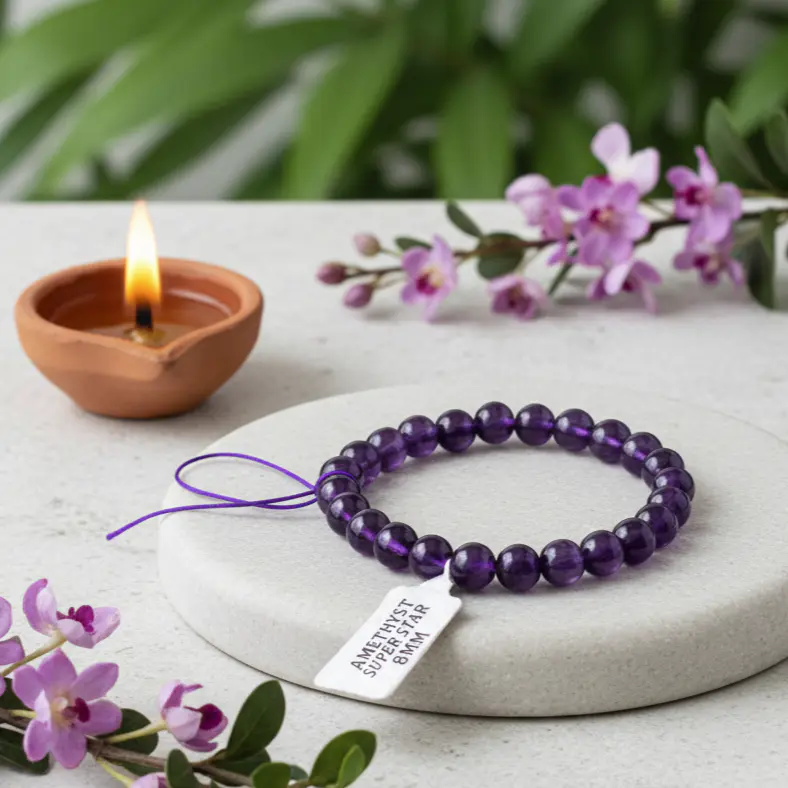 Star amethyst bracelet with polished purple crystal beads displayed on a neutral background