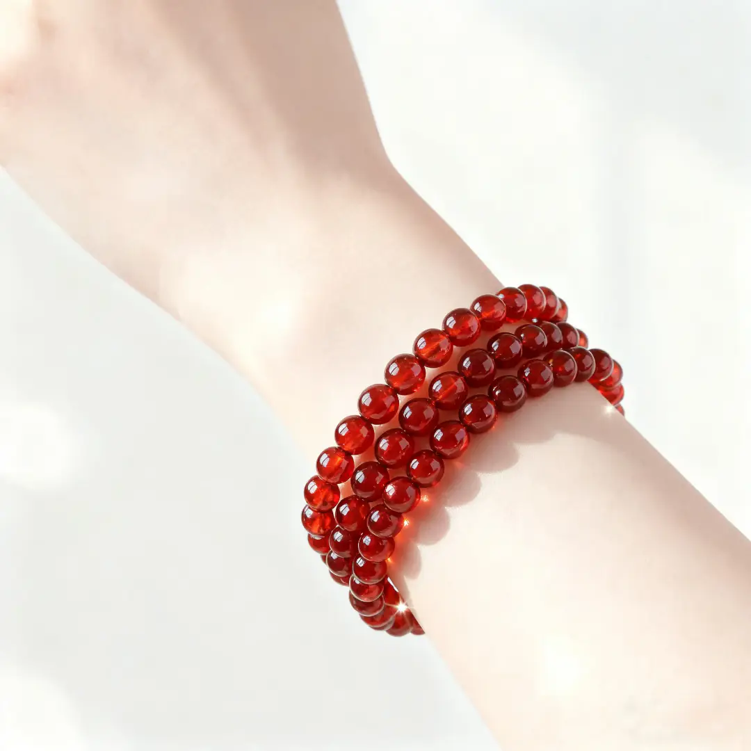 Orange garnet crystal bracelet with polished beads for daily wrist wear