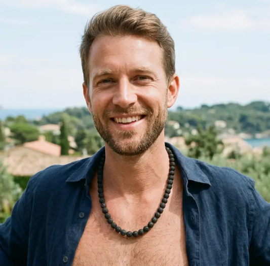 Men's black lava stone beaded necklace shown on neutral background for everyday wear