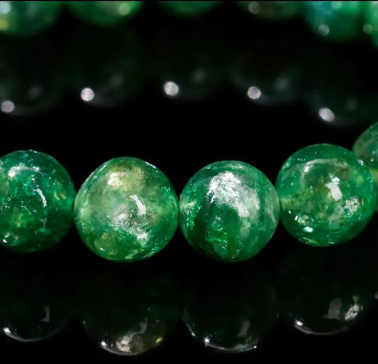 Green chlorite crystal stone used as an energy purifier for meditation and space cleansing