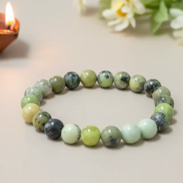 Polished Australian chrysoprase green gemstone displayed for fertility and creativity meditation
