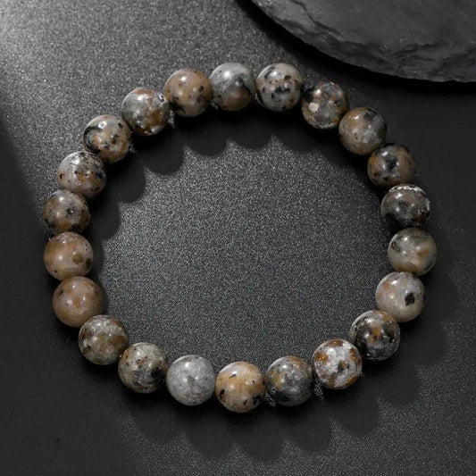 Natural yooperlite beaded bracelet on elastic cord designed for daily wear and meditation practice.