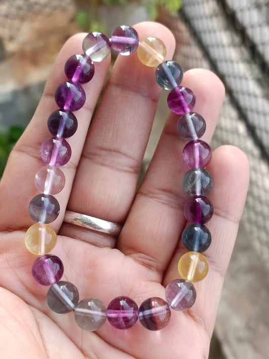 Multi fluorite beaded bracelet displayed on neutral background for everyday jewelry styling