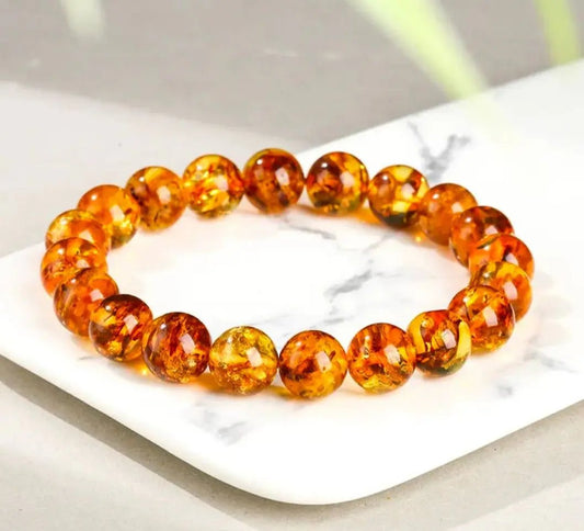 Genuine natural amber bracelet displayed on a neutral background for everyday wrist wear.
