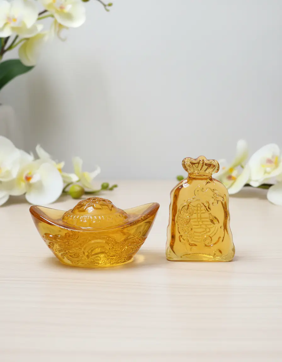 Pair of ingot wealth ornaments displayed together for feng shui home decor