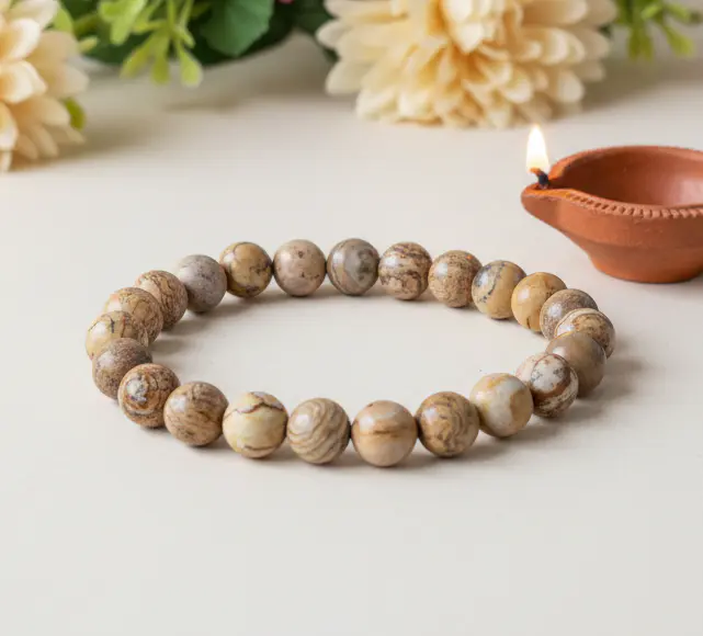 Polished picture jasper stone featuring natural earthy patterns for holistic meditation and crystal healing.
