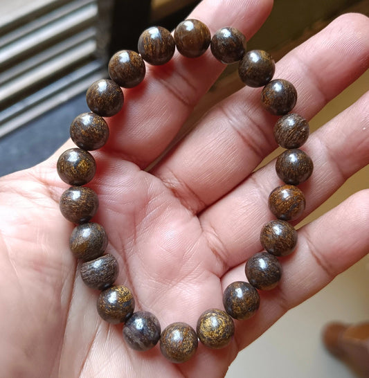 Natural bronzite beaded bracelet displayed on a neutral background for daily crystal jewelry wear