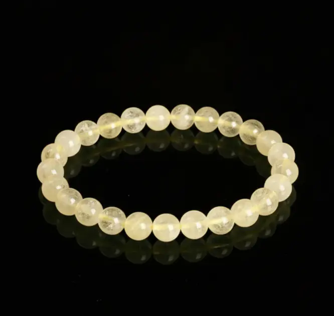 AAA lemon quartz beaded bracelet displayed on a neutral background for daily crystal jewelry wear.