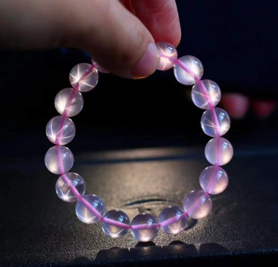 Assorted rare quality metaphysical stones bracelets displayed on a neutral background for meditation and daily wear.