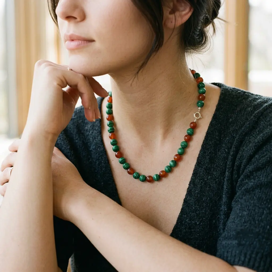 Carnelian malachite gemstone necklace featuring polished orange and green stone beads