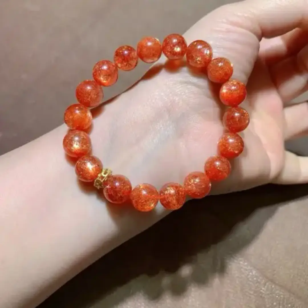 Tanzania sunstone beaded bracelet with polished crystal stones displayed on a neutral surface for daily wear